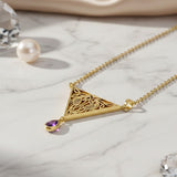 Collar de oro amarillo macizo con diseño de pájaro y nudo celta con gema GTN053