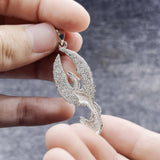 From the ashes rises the rebirth of the  phoenix A fine sterling silver with 14K Gold Accent Pendant TPV2838
